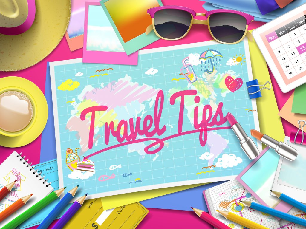 Travel Tips on the map, top view of colorful travel essentials on the table. Cruising Tips