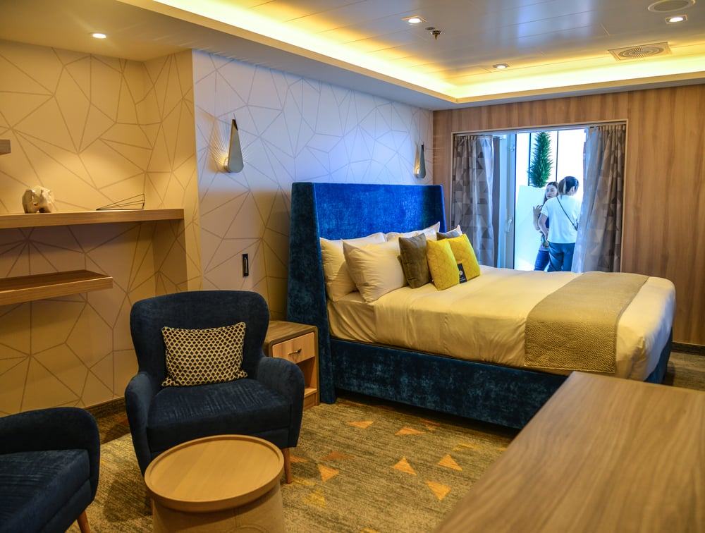 An example of the Bedroom of Ultimate Family Suites on Spectrum of the Seas cruise liner by Royal Caribbean.