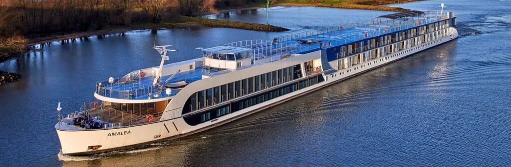 AmaLea river cruise ship sailing on the Danube River, featuring modern design, twin-balcony staterooms, and luxury amenities. A top choice for a luxury Danube cruise on AmaWaterways cruise.